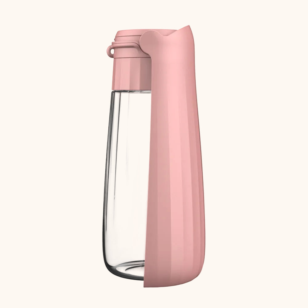 ZampySip Borraccia per cani rosa con design compatto e pratico per l'acqua in movimento.
